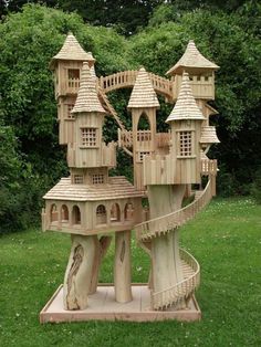 a wooden model of a castle made out of logs