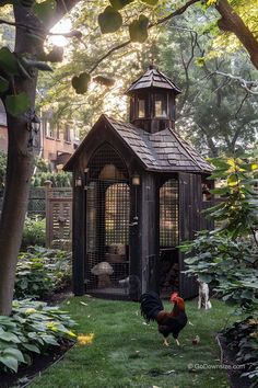 two chickens are standing in the grass near a gazebo