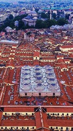 an aerial view of a city with lots of buildings