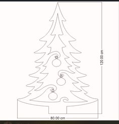 a christmas tree cut out from paper with the measurements for each piece in front of it