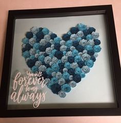 a heart made out of blue flowers with the words you're my forever always