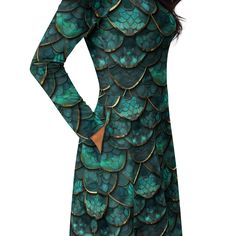 Green Dragon Scales Long Sleeve Midi Dress With Pockets Meet your new favorite dress! Its soft fabric and flattering cut will ensure you feel comfortable and feminine all day long. Plus, the fitted waist and flared bottom part of the dress will accentuate the wearer's naturally beautiful silhouette. The best part about the dress? It. Has. Pockets.   * Fabric composition in the EU: 96% polyester, 4% spandex  * Fabric composition in the US: 93% polyester, 7% spandex  * Fabric weight: 6.19 oz/yd2 ( Green V-neck Batik Print Dress, Dragon Printed Dress, Casual Crew Neck T-shirt With Dragon Print, Cotton T-shirt With Dragon Print, Dragon Print, Green Dragon, Beautiful Color Combinations, Boat Neckline, Long Sleeve Midi