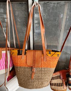 You don't have to be a millionaire to elevate your style and fashion, you need creativity and Arts. We African 1 Stores offers to you the most modern hand made tote bag woven 100% from sisal with Quality leather straps locally tunned from cows.  These beautiful handmade Tote bag originated from craftsmen living in Eastern Community in Kenya, the Akamba. Our Tote bags are woven using colored sisal and leather.The woven bag is made from products which are entirely eco-friendly and sustainable, lea Handwoven Satchel Shoulder Bag For Daily Use, Handwoven Shoulder Satchel For Daily Use, Trendy Handwoven Brown Shoulder Bag, Trendy Brown Handwoven Shoulder Bag, Woven Shoulder Bucket Bag For Market, Eco-friendly Handmade Satchel For Travel, Eco-friendly Handmade Basket Shoulder Bag, Handmade Eco-friendly Satchel For Travel, Brown Handwoven Shoulder Bag For Market