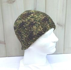 "This is a men's chunky, beanie crocheted in a camouflage yarn. The hat measures 9\" (22 cms) in depth from crown and will fit an average head circumference of 21 - 23.5\" (53 - 60 cms). Machine wash and dry, cool, gentle cycles, or hand wash, dry flat. Please read my policies and FAQ for more information. Shipping will be combined for multiple items within one order and a refund issued for overages. To view more of my items ..  lurayknitwear.etsy.com Every item is personally made by myself in m Hunting Hats, Green Beanie, Chunky Beanie, Hunting Hat, Camouflage Green, Shenandoah Valley, Large Sweaters, Chunky Crochet, Gift For Boyfriend