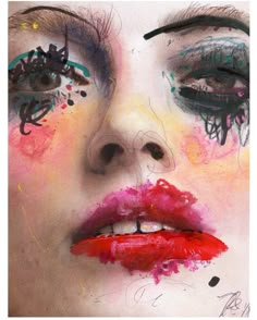 a woman's face is painted with various colors and makeup, including red lipstick