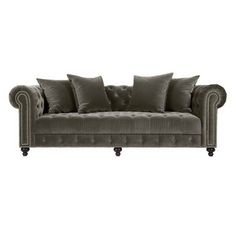 a gray couch with pillows on it