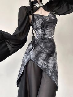 Dive into the darker, more mystical side of fashion with the Goth Wide Sleeve Midi Qipao Dress. It updates the traditional cheongsam with a gothic twist, showcasing a dark forest print, pearl bead embellishments, and seductive cut-outs. This dress blends traditional elegance with unique goth elements, perfect for festivals, parties, and those seeking a standout look. Goth aesthetic Dark forest print detail Traditional cheongsam dress design Pearl bead details at neck & waist Cut out detail at bust High neck Long sleeve Chiffon Aesthetic Dark Forest, Black 2 Piece Dress, Traditional Cheongsam, Women Turtleneck, Crop Pullover, 2 Piece Dress, Forest Print, Qipao Dress, Dress Slim