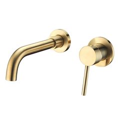 a gold faucet with two handles and nozzles on the side, against a white background