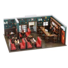 a model of a restaurant with red chairs and tables