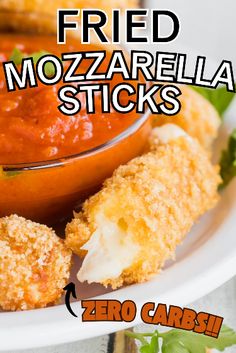 fried mozzarella sticks on a plate with sauce