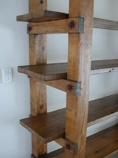 the shelves are made out of wooden boards