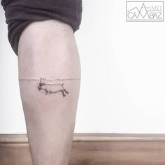 a person with a small tattoo on their leg