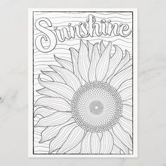 a sunflower with the word sunshine on it's face in black and white