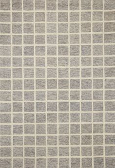 a gray and white rug with squares on it