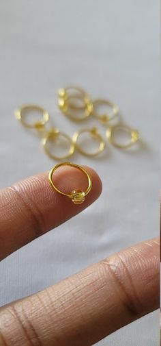 8pcs 12mm Gold Hair Rings With a Gold Accent Bead Perfect For Dreadlocks, Braids, Twist, Plaits, Buns & Up-dos -Add hair rings to a variety of hair styles for a classic and unique look. Simply open ring by twisting gently sideways. Apply to desired location then gently twist back together. Do not pull apart, this may cause the ring to loose its shape. Caring for most jewelry jewelry... Depending on the type of jewelry purchased, be sure to remove any jewelry before you bathe, wash your hands Gold Hair Rings, Braid Rings, Dreadlocks Braids, Iron Jewelry, Loc Jewelry, Braids Twist, Braided Ring, Dreadlock Hairstyles, Up Dos