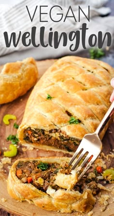 vegan wellington on a cutting board with a fork in it and the text overlay reads, vegan wellington