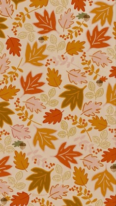 an orange and yellow pattern with leaves on it