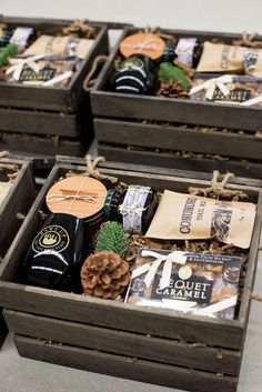 four wooden boxes filled with different types of beer