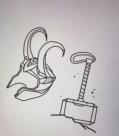 a drawing of an animal head next to a hammer