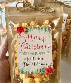 a bag of christmas treats with the message merry christmas thanks for popping by on it