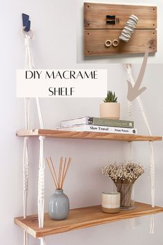 a shelf with some books and vases on it