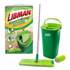 a green mop and dustbin with the lid open next to it's cleaning kit