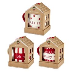 three small boxes with christmas decorations in them