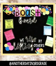 a bulletin board with the words boosh board written in different colors and writing on it