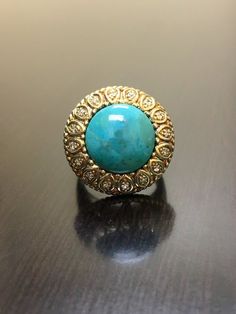 Art Deco Yellow Gold Turquoise Engagement Ring - Gold Halo Turquoise Wedding Ring - Art Deco Turquoi Luxury Turquoise Ring In Yellow Gold, Gold Turquoise Ring For Anniversary, Gold Turquoise Ring Fine Jewelry, Heirloom Turquoise Round Jewelry, Formal Turquoise Rings With Gemstone Accents, Luxury Turquoise Jewelry With Center Stone, Round Turquoise Ring With Gemstone Accents, Elegant Turquoise Ring With Stone Setting, Blue Cabochon Wedding Ring