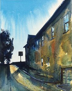 watercolor painting of an old building and street sign on the side of the road