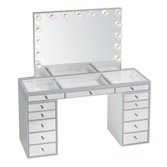 an illuminated vanity with drawers and mirror