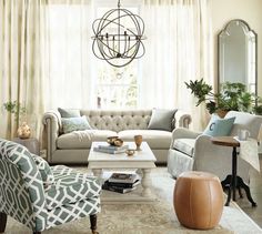 a living room filled with furniture and decor