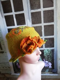 Sold  But can be reworked similarly if necessary A beautiful handmade, unique fall hat for women in pretty colors The hat is pretty much a Brimm style hat. It is handmade from 100% merino wool and is therefore beautifully soft and cuddly. The felted merino wool is beautifully heat-insulating. I felted the hat so that it is water-repellent. The hat is made of fine merino wool felted with silk fabric. The shape is very stylish yet simple. It suits autumn and almost every woman. The brooch is a pre Whimsical One Size Fall Hat, Whimsical Fall Hat, Bohemian Wool Hat For Fall, Handmade Brimmed Felt Hat For Fall, Whimsical Handmade Fall Hats, Bohemian Wool Felt Hat For Fall, Handmade Felt Hat With Curved Brim For Fall, Handmade Curved Brim Felt Hat For Fall, Handmade Wide Brim Felt Hat For Fall