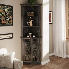 a living room scene with focus on the corner cabinet