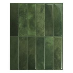 green glass tiles are arranged in rows on a white background, with the same color as the