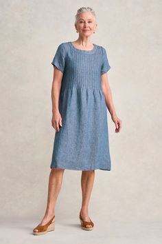 This timeless linen shift dress in Indigo Twill is perfect for lazy summer days. In a new shape for Blue Illusion with a short sleeve and scoop neckline, this dress is crafted from a comfortable hemp linen blend. C’est joli! Indigo Cotton Dress With Buttons, Blue Knee-length Linen Dress With Relaxed Fit, Indigo Cotton V-neck Dress, Indigo Relaxed Fit Knee-length Denim Dress, Indigo Midi-length Cotton Denim Dress, Linen Shift Dress, Spring Wear, Work Wear Women, Knitwear Cardigan