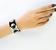 Statement Black and White Geometric Bracelet, Wide Unique Bracelet, Contemporary Jewelry for Women, Unique Modern Bracelet, 3D Printed  Materials: PLA plastic (biodegradable thermoplastic derived from corn), tulle fabric  It's completely new jewelry design and geometric precision makes it stand out from other bracelet designs. I designed this unique piece of jewelry in CAD 3D modeling software then experimented with 3D printing on tulle fabric. The result is an extremely lightweight, elegant and Modern Bracelet, 3d Printed Jewelry, Geometric Bracelet, Large Bracelet, Modern Bracelets, Unique Bracelets, Tulle Fabric, Contemporary Jewelry, Braided Bracelets