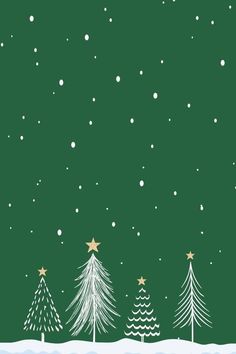 christmas trees in the snow with stars on them and green sky above it, as well as falling snowflakes