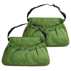 two green purses with black straps on each side and one in the other's pocket