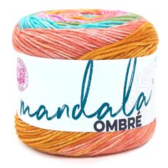 a ball of yarn with the words mandala ombre written in black on it