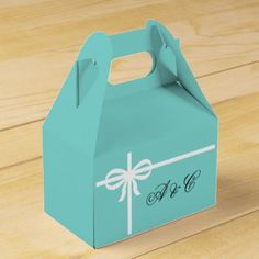 a blue box with a white bow on it