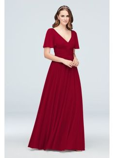 a woman wearing a long red bridesmaid dress with short sleeves and a v neckline