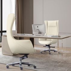 an office desk with two chairs and a computer monitor on the table in front of it