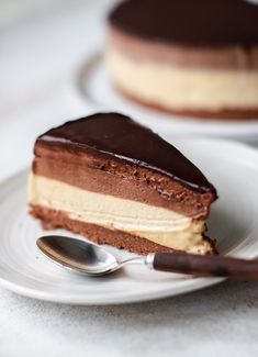 a piece of cake on a plate with a spoon