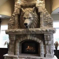 a statue of a wolf in front of a fireplace