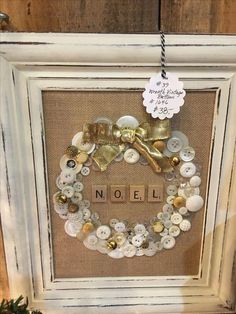 a frame with buttons and a sign that says noell