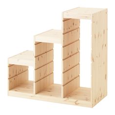 a wooden toy set with drawers and shelves