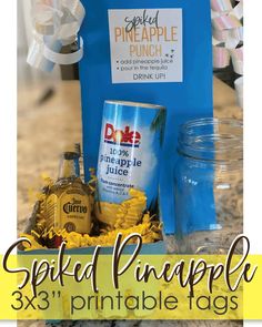 the sprited pineapple 3x3 printable tags are in front of a blue bag