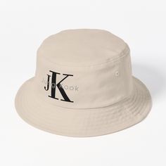 This packable, scrunchable, lightweight headwear classic is ready for adventure, from the beach to the street to the trail Breathable 100% cotton with eyelet ventilation Flat top Moderate brim is 2.2"" (5.5 cm) wide to keep the sun off your face Unstructured crown is 3.1"" (8 cm) deep Easy care: just spot clean and dry in shade. K Pop Bucket Hat, Ck Logo, Hats For Sale, Flats Top, The Trail, Bucket Hat, The Sun, The Beach, Crown