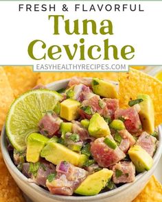 a bowl filled with tuna and avocado salsa next to tortilla chips